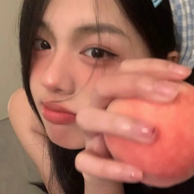 桃花含露又春风